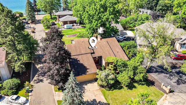 3234 Pine Lake Rd, West Bloomfield, MI 48324 - aerial view of residential area with a large body of water