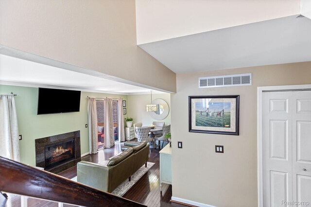 5305 Wright Way S, West Bloomfield, MI 48322 - interior space with a glass covered fireplace and wood finished floors