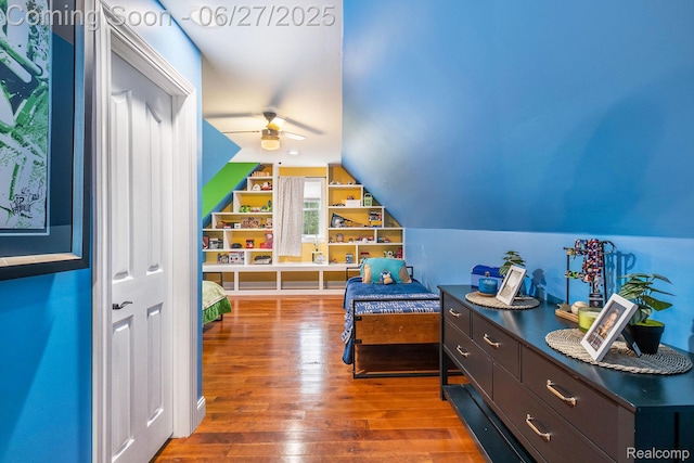 5408 N Seymour Rd, Flushing, MI 48433 - bedroom featuring hardwood / wood-style floors and vaulted ceiling