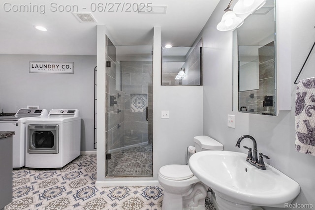5408 N Seymour Rd, Flushing, MI 48433 - full bath featuring a stall shower, separate washer and dryer, and recessed lighting