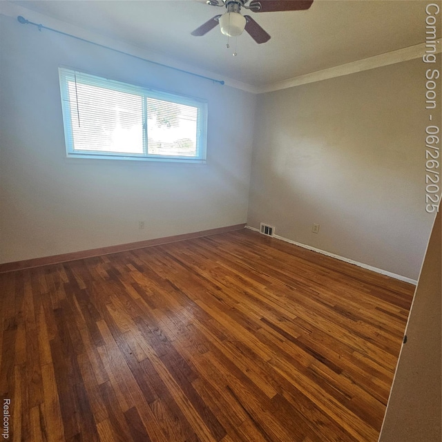 30146 Boewe Dr, Warren, MI 48092 - empty room with ornamental molding, dark wood finished floors, and ceiling fan