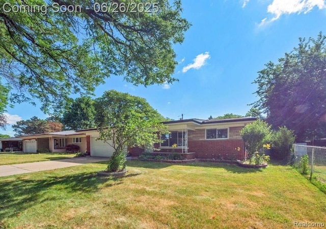 30146 Boewe Dr, Warren, MI 48092 - ranch-style house featuring an attached garage, driveway, and brick siding