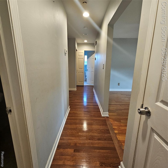 30146 Boewe Dr, Warren, MI 48092 - corridor featuring dark wood-style flooring and recessed lighting