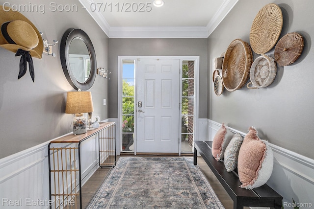 59141 Peters Barn Dr, South Lyon, MI 48178 - entryway featuring ornamental molding, wainscoting, and wood finished floors