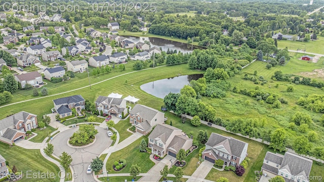 59141 Peters Barn Dr, South Lyon, MI 48178 - aerial view of residential area with a large body of water