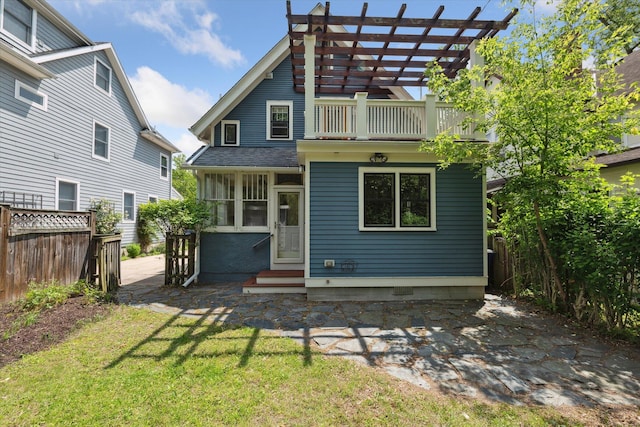 450 S 1st St, Ann Arbor, MI 48103 - back of property featuring entry steps, a balcony, a pergola, and a patio