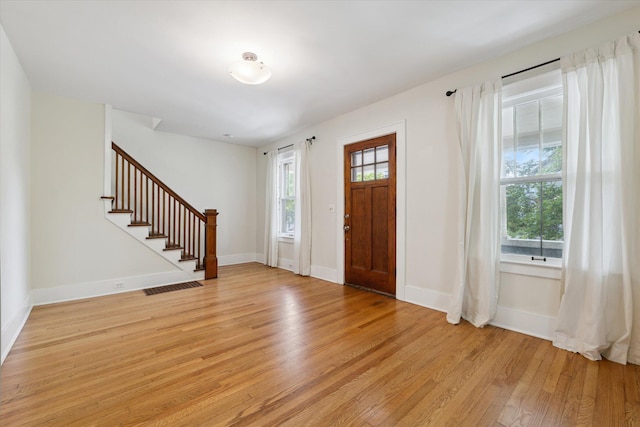 450 S 1st St, Ann Arbor, MI 48103 - foyer entrance featuring stairway and light wood-style flooring