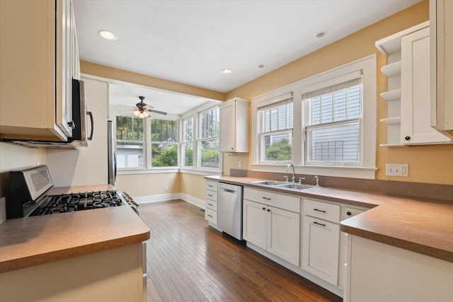 450 S 1st St, Ann Arbor, MI 48103 - kitchen with appliances with stainless steel finishes, open shelves, dark wood-style flooring, ceiling fan, and white cabinetry