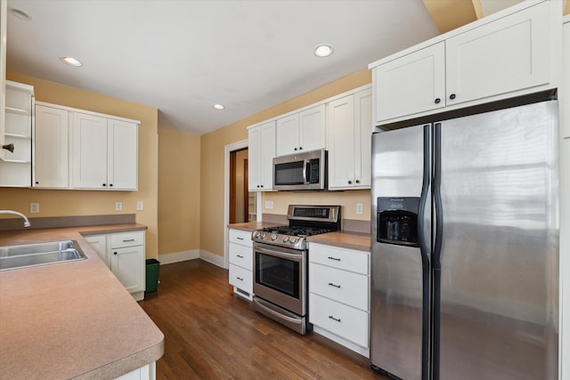 450 S 1st St, Ann Arbor, MI 48103 - kitchen with stainless steel appliances, open shelves, dark wood-type flooring, white cabinetry, and recessed lighting