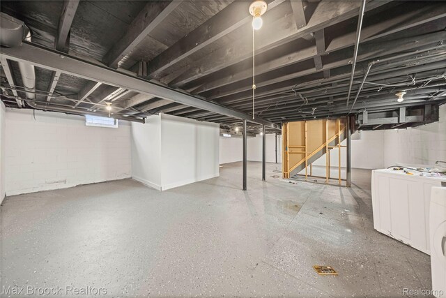 1122 Symes Ct, Royal Oak, MI 48067 - basement featuring washer / dryer and stairway
