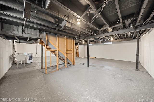 1122 Symes Ct, Royal Oak, MI 48067 - unfinished below grade area with washer and dryer, stairway, and concrete block wall