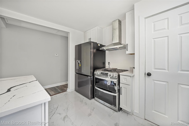 1122 Symes Ct, Royal Oak, MI 48067 - kitchen featuring wall chimney range hood, stainless steel appliances, light marble finish floors, white cabinetry, and light stone counters