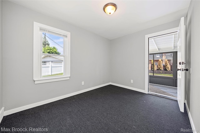1122 Symes Ct, Royal Oak, MI 48067 - spare room with dark colored carpet and baseboards