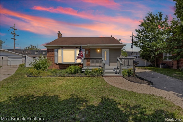 1122 Symes Ct, Royal Oak, MI 48067 - bungalow-style home featuring a porch, a chimney, and brick siding