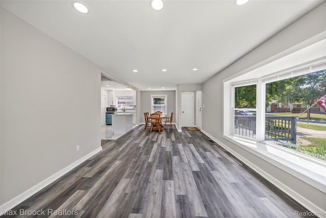 1122 Symes Ct, Royal Oak, MI 48067 - living area with recessed lighting, plenty of natural light, and dark wood-style flooring