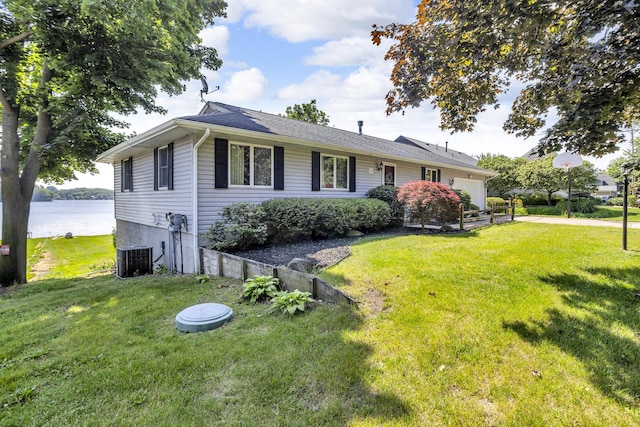 38 Evans Trl, Tipton, MI 49287 - ranch-style home with a garage, a front yard, and a water view
