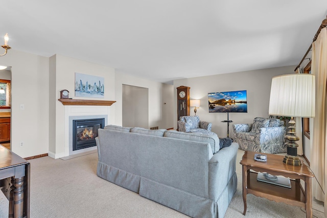 38 Evans Trl, Tipton, MI 49287 - living area featuring a glass covered fireplace and light colored carpet