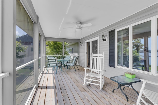 38 Evans Trl, Tipton, MI 49287 - sunroom / solarium featuring ceiling fan and outdoor dining space