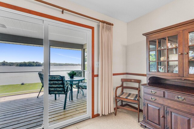 38 Evans Trl, Tipton, MI 49287 - dining area with light carpet and a water view
