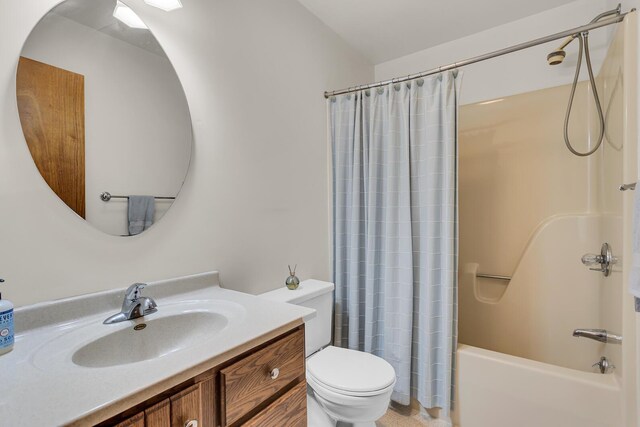 38 Evans Trl, Tipton, MI 49287 - bathroom featuring vanity and shower / bath combo with shower curtain