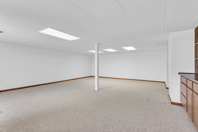 38 Evans Trl, Tipton, MI 49287 - finished below grade area with light colored carpet and a paneled ceiling
