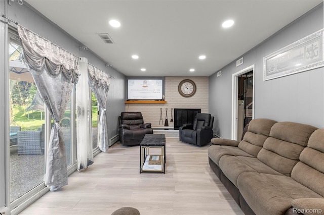 2738 Berry Dr, Bloomfield Hills, MI 48304 - living area with recessed lighting, light wood-style floors, and a fireplace