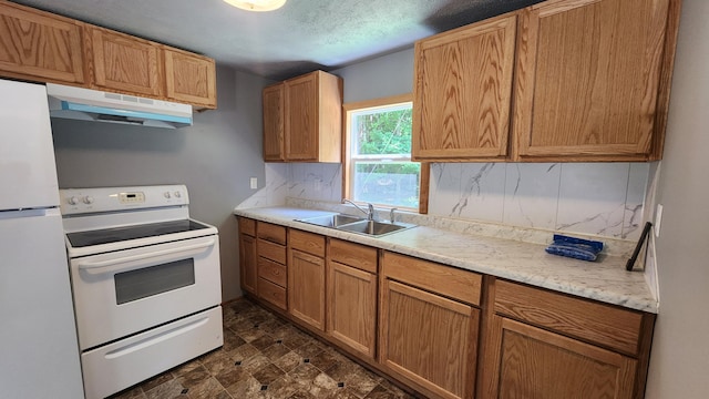 5213 S Newcosta Ave, Newaygo, MI 49337 - kitchen featuring white appliances, under cabinet range hood, light countertops, tasteful backsplash, and stone finish flooring