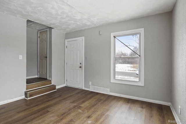 9110 Mansfield St, Detroit, MI 48228 - foyer entrance with baseboards and wood finished floors