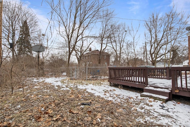 9110 Mansfield St, Detroit, MI 48228 - yard covered in snow featuring a wooden deck