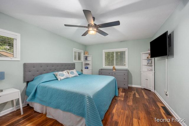 12865 S Englewright Dr, Sand Lake, MI 49343 - bedroom with wood finished floors and ceiling fan