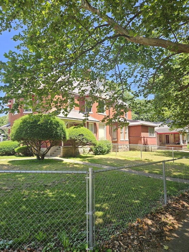 702 N Superior St, Albion, MI 49224 - view of front of house with a fenced front yard