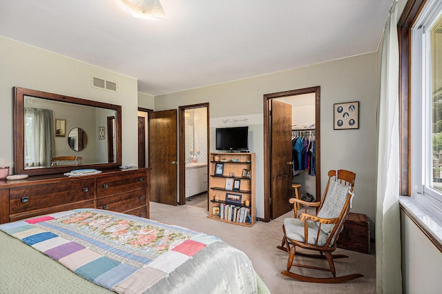 8025 Fosdick Rd, Saline, MI 48176 - bedroom featuring light colored carpet, a spacious closet, and a closet
