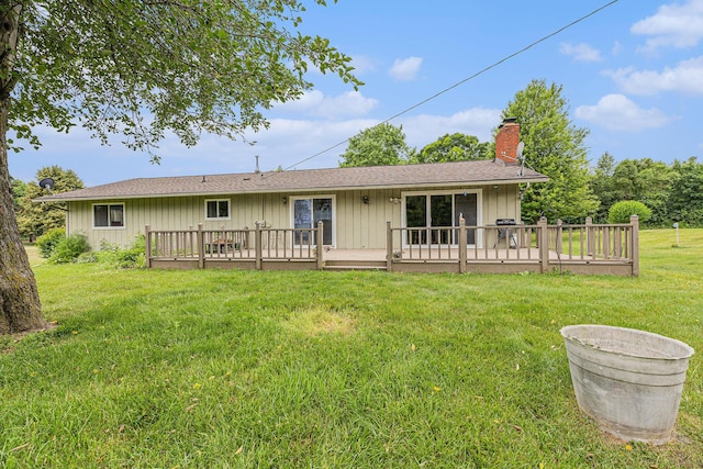 8025 Fosdick Rd, Saline, MI 48176 - back of property with a chimney, a yard, and a deck