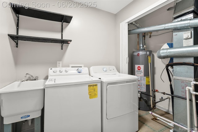 3343 Northpointe Blvd, Melvindale, MI 48122 - laundry room with water heater, separate washer and dryer, and wood finished floors
