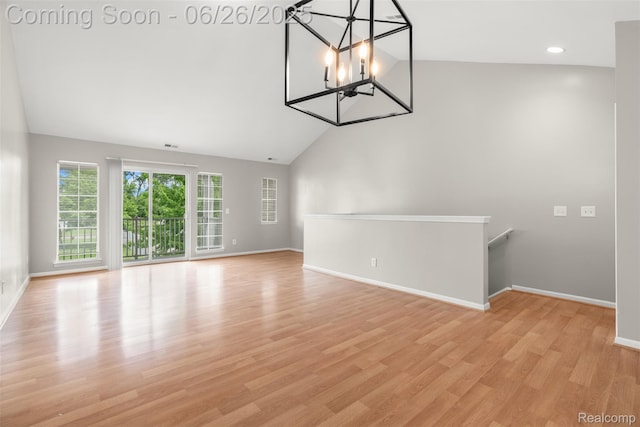 3343 Northpointe Blvd, Melvindale, MI 48122 - unfurnished room with lofted ceiling, a chandelier, light wood-style floors, and recessed lighting