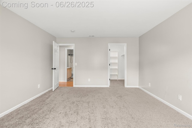 3343 Northpointe Blvd, Melvindale, MI 48122 - unfurnished bedroom with carpet, a walk in closet, and a closet