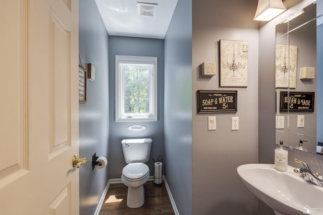 7145 S Valley Cir, Lambertville, MI 48144 - bathroom featuring a sink and wood finished floors