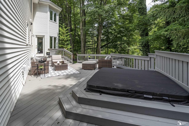 7145 S Valley Cir, Lambertville, MI 48144 - wooden deck with outdoor lounge area, a covered hot tub, and view of scattered trees