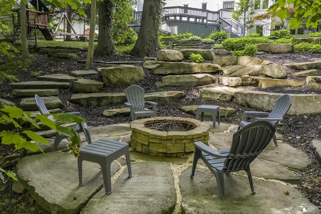 7145 S Valley Cir, Lambertville, MI 48144 - view of patio / terrace featuring an outdoor fire pit, stairway, and a deck