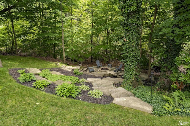 7145 S Valley Cir, Lambertville, MI 48144 - view of grassy yard with an outdoor fire pit