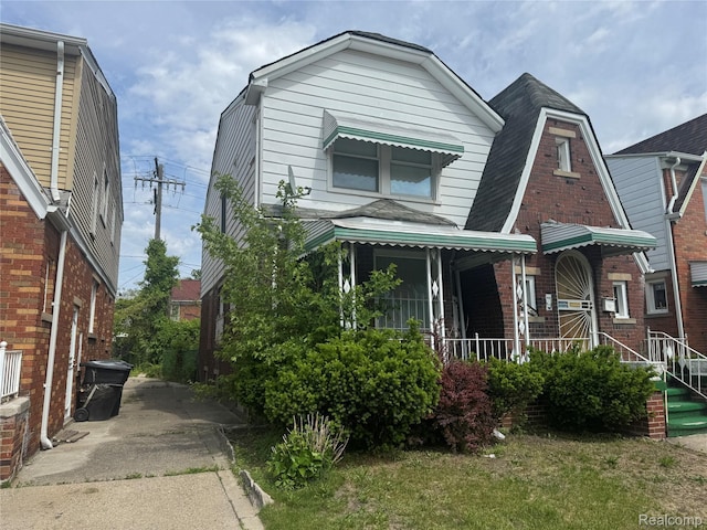 16740 Woodingham Dr, Detroit, MI 48221 - view of front of property with brick siding and roof with shingles