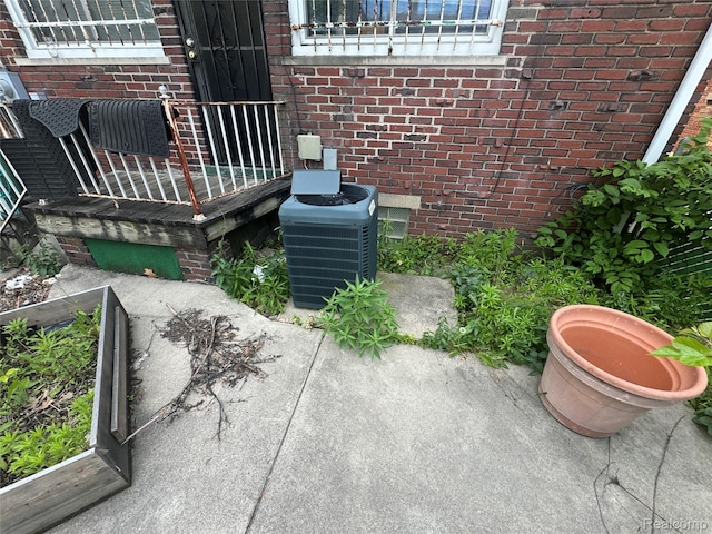 16740 Woodingham Dr, Detroit, MI 48221 - exterior view of a cooling unit and brick siding