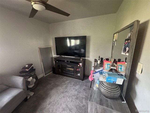 16740 Woodingham Dr, Detroit, MI 48221 - carpeted living area featuring a ceiling fan and baseboards
