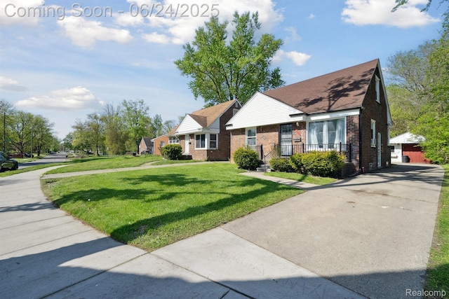 18625 Codding St, Detroit, MI 48219 - bungalow-style home featuring brick siding, a front yard, and driveway