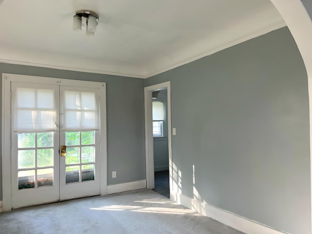 3254 W W Philadelphia St, Detroit, MI 48206 - empty room featuring french doors, carpet, and ornamental molding
