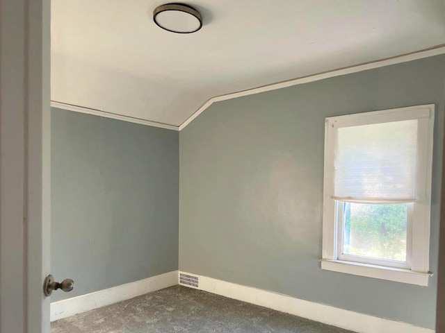 3254 W W Philadelphia St, Detroit, MI 48206 - empty room featuring carpet, ornamental molding, and lofted ceiling