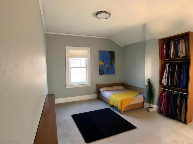 3254 W W Philadelphia St, Detroit, MI 48206 - carpeted bedroom featuring a closet, lofted ceiling, and crown molding