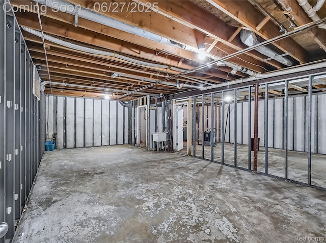 5050 Burton Rd, Capac, MI 48014 - unfinished basement with a sink