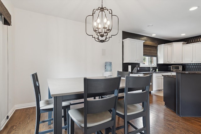 46746 Merion Cir, Northville, MI 48168 - dining space featuring dark wood-type flooring, a chandelier, and recessed lighting