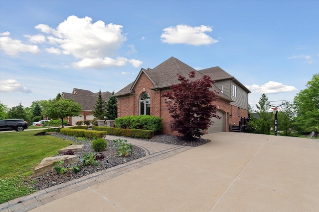 46746 Merion Cir, Northville, MI 48168 - view of property exterior featuring brick siding, concrete driveway, a garage, a shingled roof, and a yard
